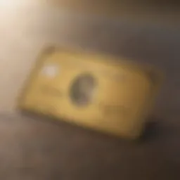 An American Express Gold Card prominently displayed on a luxurious surface