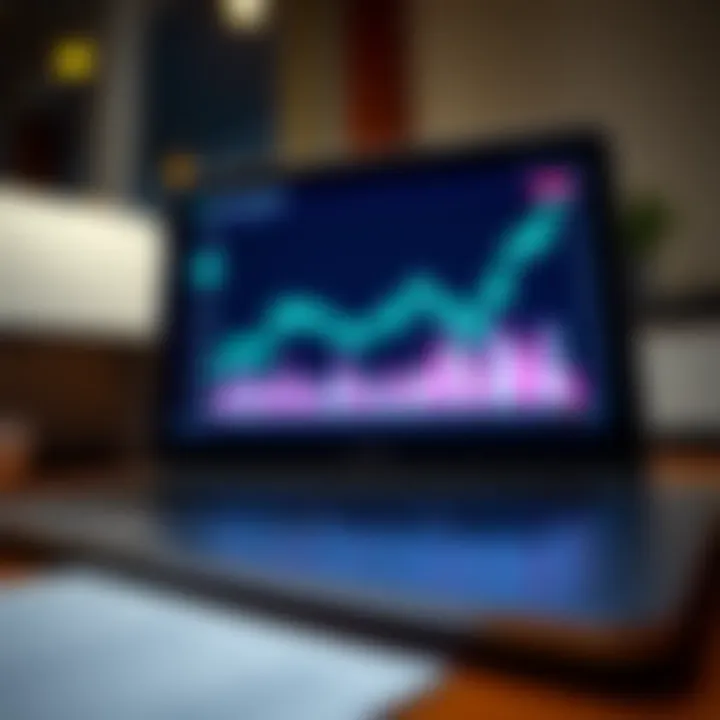 A close-up of a laptop with a financial graph on the screen.