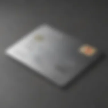 Sleek Silver Metal Credit Card Close-up of a silver metal credit card on a sleek surface